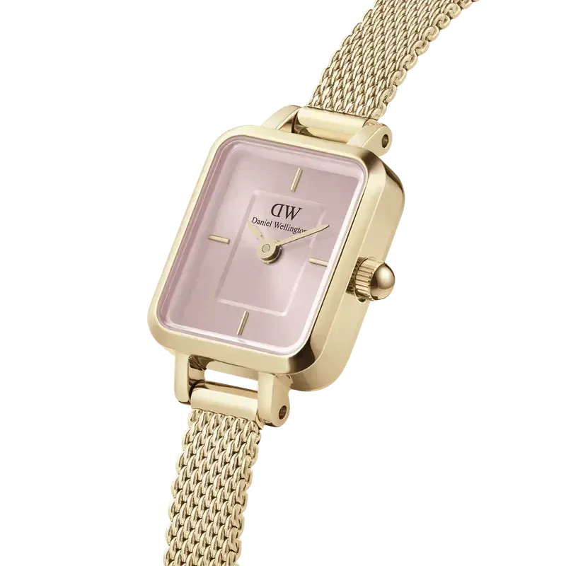 Daniel Wellington Quadro Mini watch with a gold mesh strap and elegant blush pink sunray dial.