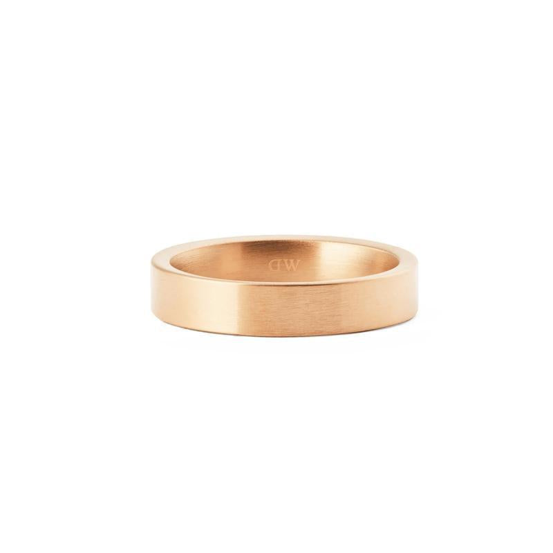 Minimalist rose gold Line ring with a brushed finish and 4.5 mm band, featuring a subtle Daniel Wellington logo engraving.