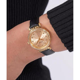 Guess Ladies Black Gold Tone Analog Watch