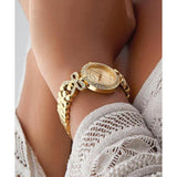 Guess Ladies Gold Tone Analog Watch