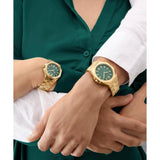 Guess Ladies Gold Tone Analog Watch