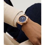 Guess Mens Blue Rose Gold Tone Analog Watch