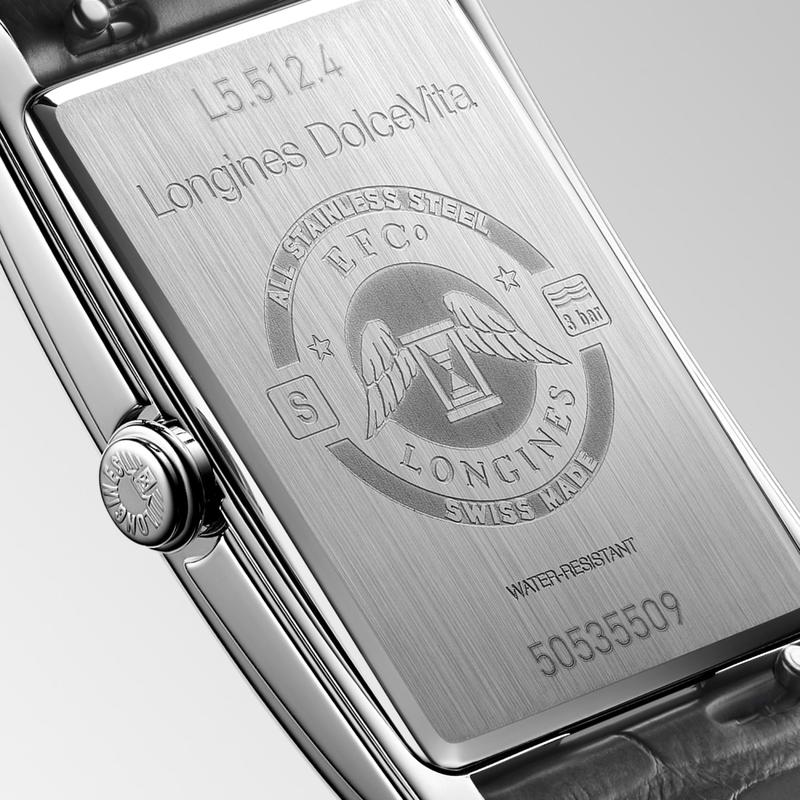 Engraved stainless steel case back of the Longines DolceVita quartz watch with signature winged hourglass logo.