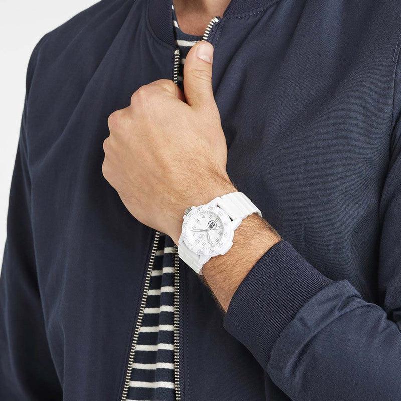 Luminox Leatherback SEA Turtle 39mm watch with a white dial and matching silicone strap on a wrist.