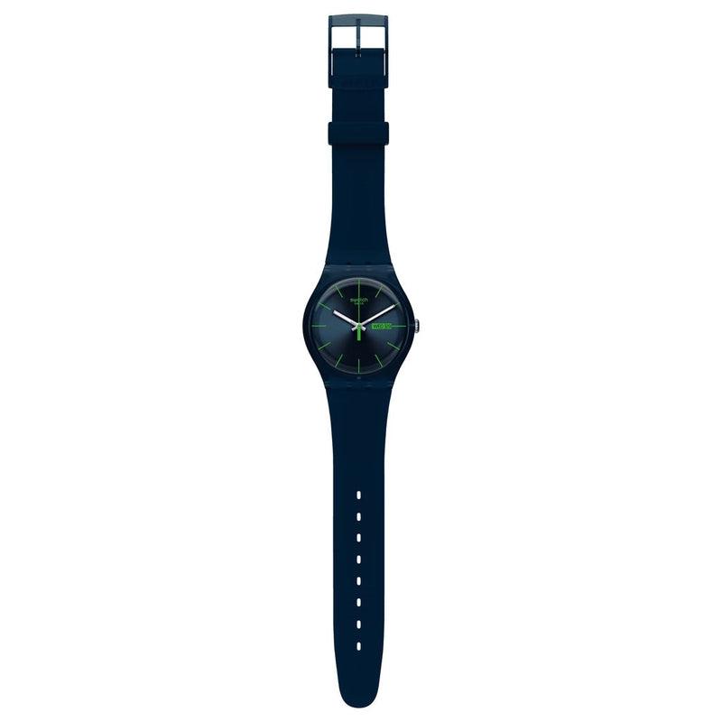 Swatch Blue Rebel watch with a 41mm plastic case, comfortable silicone strap, and vibrant green accents on a dark dial.