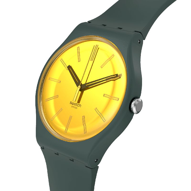 Swatch Gold in the Garden watch featuring a vibrant yellow mirror dial, green biosourced case, and sleek silicone strap.